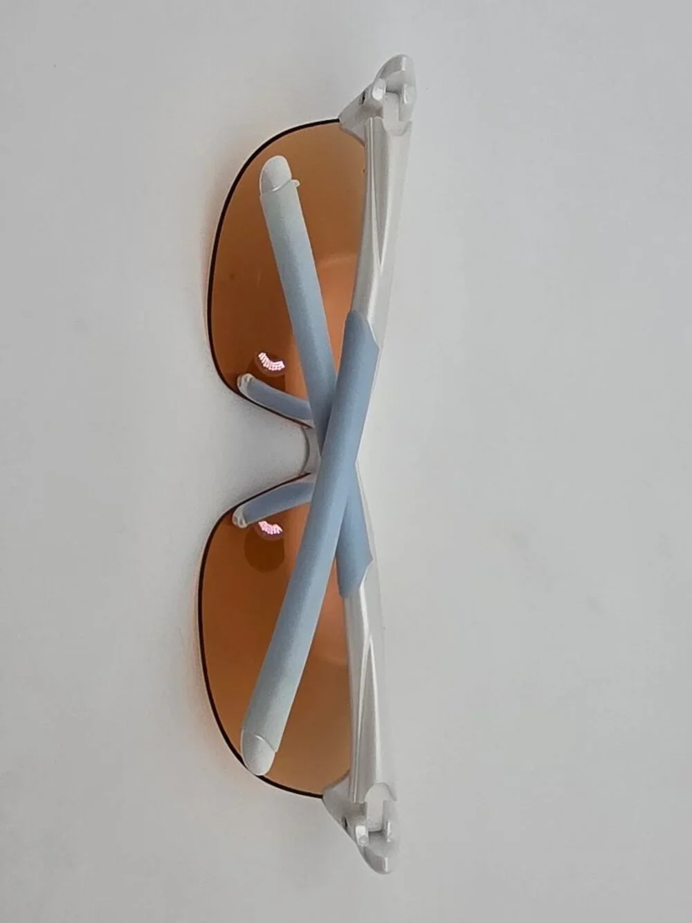 Tifosi Wisp Pearl White Baby Blue Frame Purple Mirror Lens Rimless Sunglasses